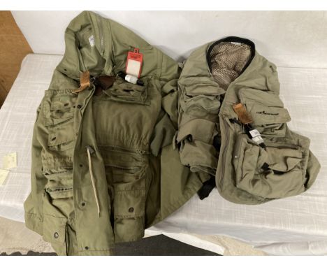 A WILDERNESS FLY FISHING GILET WITH VARIOUS TOOLS ATTATCHED AND A REGATTA COAT