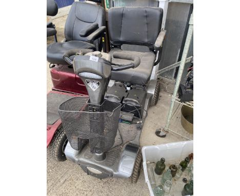 A STERLING MOBILITY SCOOTER COMPLETE WITH KEY AND CHARGER
