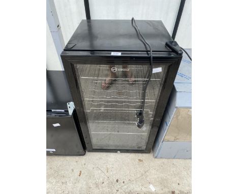 A SUBCOLD GLASS FRONTED BOTTLE FRIDGE