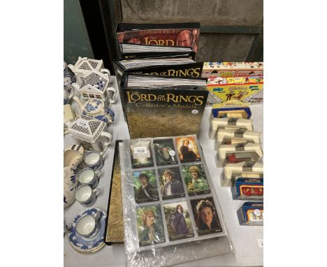 A COLLECTION OF COLLECTOR'S BOOKS FOR THE LORD OF THE RINGS MODELS TO INCLUDE 99 - 121 COMPLETE, 78-98 COMPLETE, 59-77 COMPLE