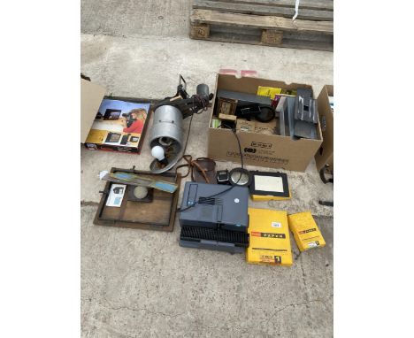 AN ASSORTMENT OF PHOTOGRAPHY ITEMS TO INCLUDE A SLIDE PROJECTOR, LENS' AND KODAK PHOTO PAPER ETC