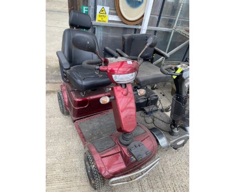 A LARGE ABELWORLD MOBILITY SCOOTER COMPLETE WITH KEY