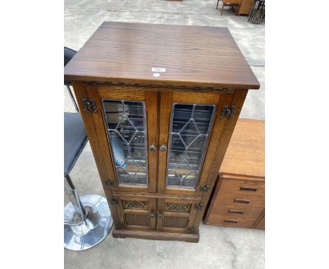 AN OAK WOOD BROS. HI-FI CABINET WITH GLAZED AND LEADED DOORS, PANASONIC TURNTABLE, TUNER, AMPLIFIER, DOUBLE CASSETTE DECK AND