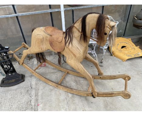 A LARGE VINTAGE WOODEN ROCKING HORSE