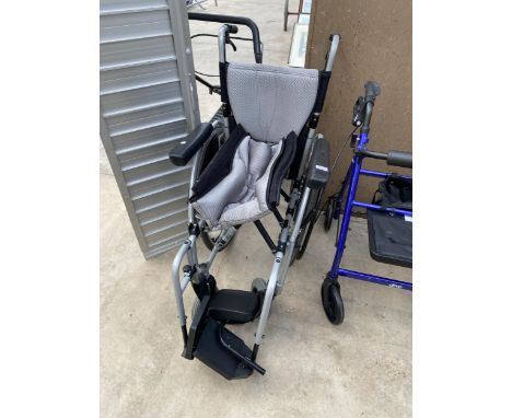 A KARMA SELF PROPPELLED AND PUSH ALONG WHEELCHAIR