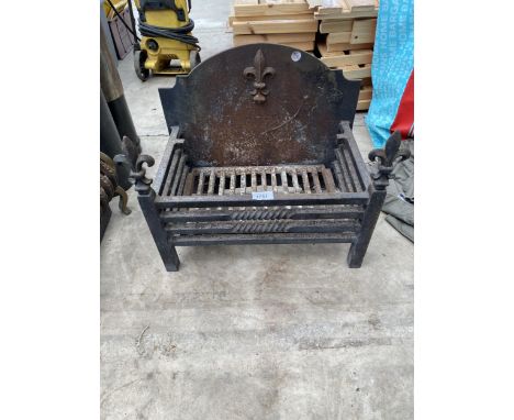A DECORATIVE CAST IRON FIRE GRATE