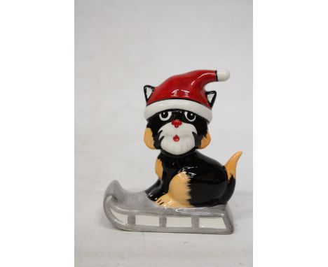 A LORNA BAILEY CAT ON A SLEDGE