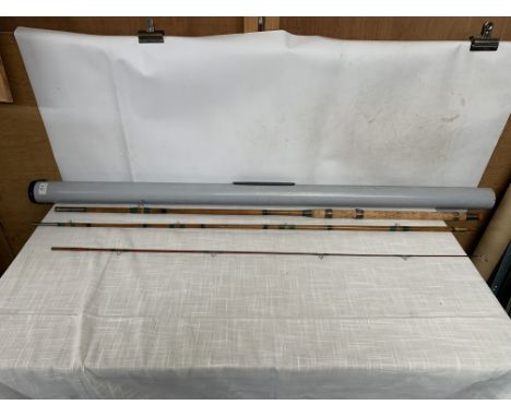 A VINTAGE THREE PIECE SPLIT CANE FISHING ROD WITH CARRY BAG AND TUBE