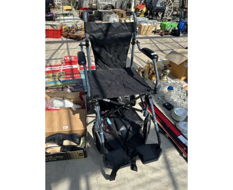 A FOLDING WHEELCHAIR
