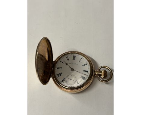 AN A W W &amp; CO WALTHAM MASS GOLD PLATED POCKET WATCH WITH WHITE ENAMEL FACE, ROMAN NUMERALS AND SUB DIAL. A STAR DENNISON 