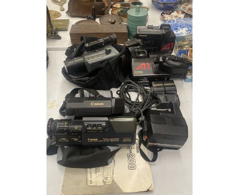 A COLLECTION OF VINTAGE CAMCORDERS AND CAMERAS TO INCLUDE TWO PANASONIC NEW VICION A1 VIDEO CAMERAS ALONG WITH A CANON VC-200
