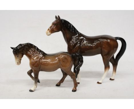 A BESWICK PRANCING STALLION HORSE TOGETHER WITH A SYLVAC BAY HORSE BOTH IN A GLOSS FINISH