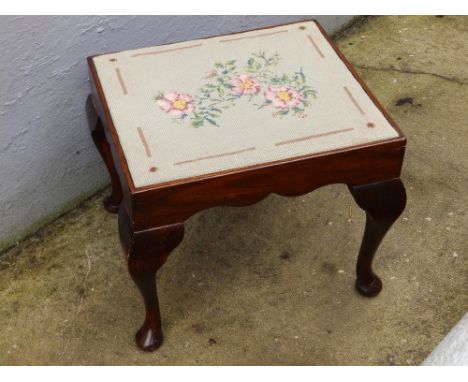 A reproduction style cabriole leg stool with drop in tapestry seat.