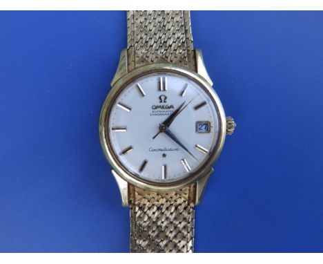 A gent's 18ct gold Omega Constellation Automatic Chronometer bracelet wrist watch, the champagne dial with baton hour markers