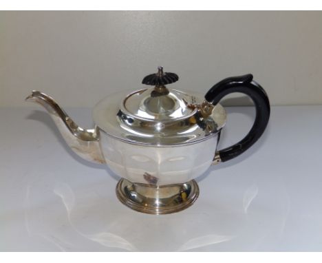 A silver circular teapot - EV, Sheffield 1930.