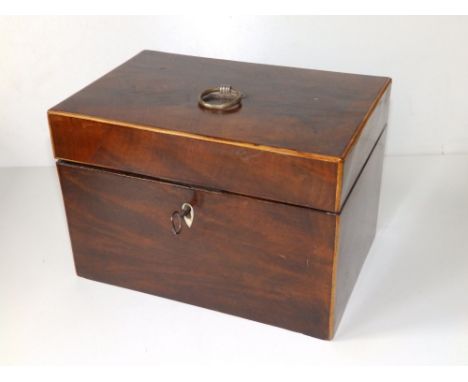 A George III mahogany tea caddy.
