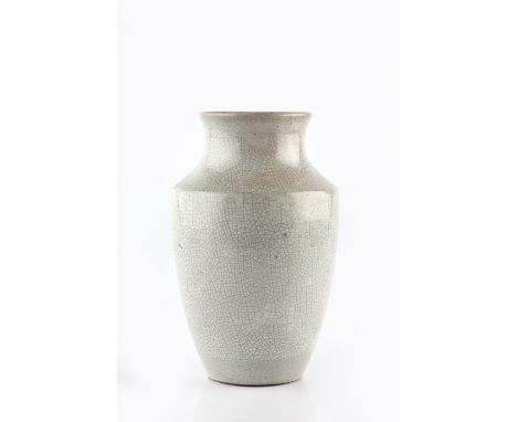 A Chinese Guan style baluster vase 19th Century decorated with a grey crackled glaze, 18cm high