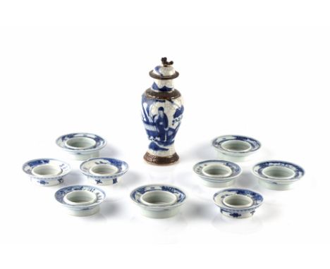 A collection of nine Chinese blue and white porcelain vase mounts/rims 19th Century with various landscape and other designs,