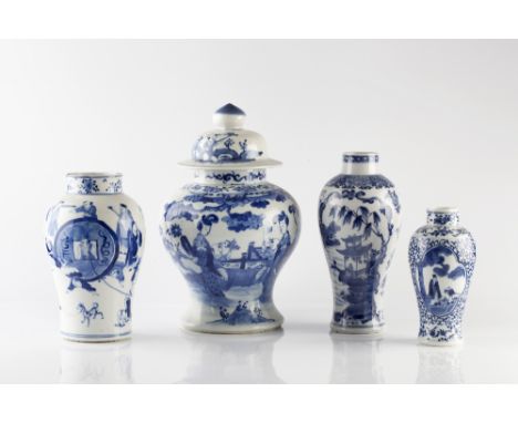 A Chinese blue and white baluster vase and cover 19th Century figures playing on a terrace, 25cm and three other Chinese blue