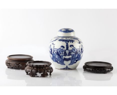 A Chinese blue and white porcelain ginger jar and cover 19th Century having a garden scene to the exterior, Kangxi mark, with