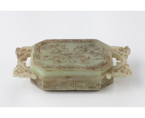 A Chinese carved jade box and cover late 19th Century with dragon handles, 20cm x 9.5cm