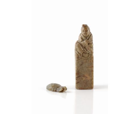 A Chinese soapstone seal early 19th Century carved with a Buddha, 12cm and a small jade carved beetle, 19th Century (2)