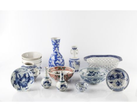 A Chinese blue and white vase late 19th Century of cracked-ice design, 22cm and fourteen other Chinese and Japanese blue and 