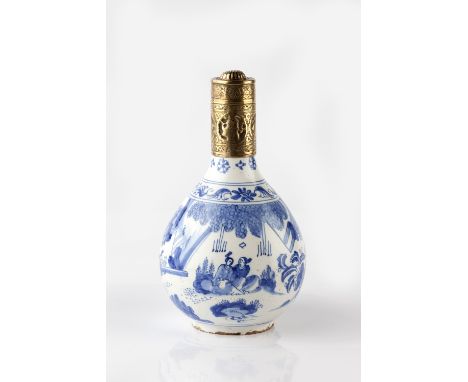 A Dutch Delft blue and white bottle vase circa 1660-80 decorated with a Chinese landscape scene with figures in the Ming styl