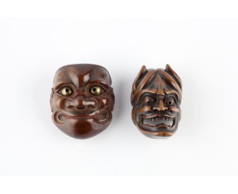 A wood Noh netsuke mask of Hannya 19th Century signed Shuzan, with pierced eyes and mouth and a netsuke mask of Beshimi, sign