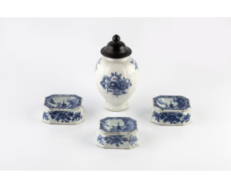 A Chinese export blue and white tea caddy 18th Century with later hardwood cover, 12cm high and three Chinese blue and white 