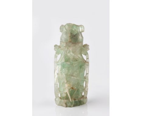 A Chinese fluorite vase and cover 19th Century carved with flower heads, 23cm high