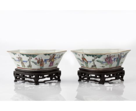 A pair of Chinese porcelain ruyi head shaped bowls 19th Century Tongzhi seal mark, decorated in famille rose enamels with fig