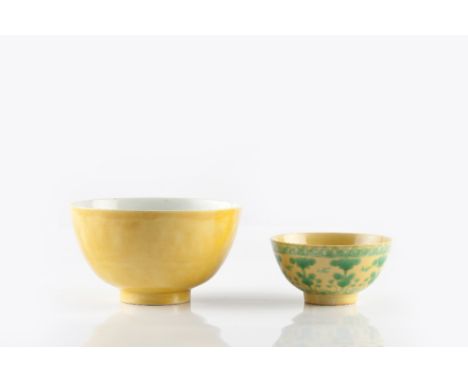 A Chinese high sided porcelain bowl 19th Century exterior decorated with an Imperial yellow glaze with white interior, foot w