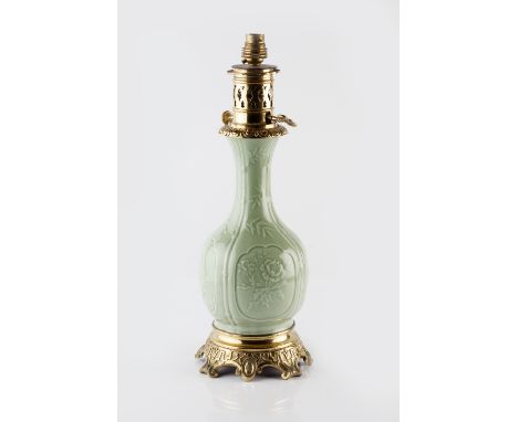 A Chinese celadon vase 19th/20th Century converted to a table lamp with gilt metal mounts, 40cm high overall