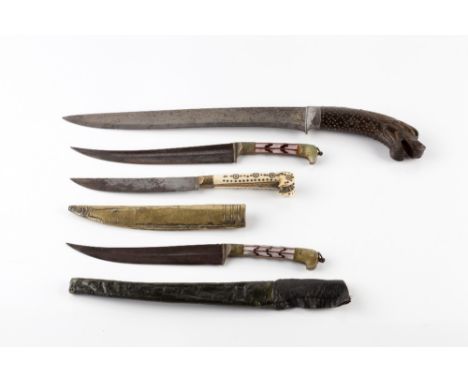 An Indo Persian dagger (Khangar) 19th Century with inset horn lion's head handle and damascene inlaid blade, 37cm, an Indian 