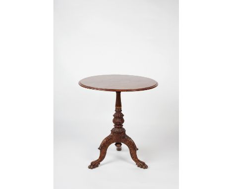 An Anglo-Indian inlaid and carved tripod table 19th century with circular wood inlay to the top and legs carved with foliate 