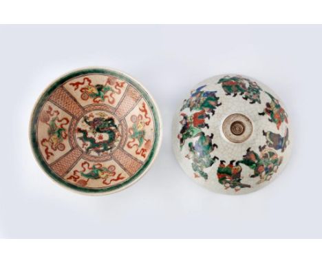A pair of Canton porcelain wide-mouthed shallow bowls late Guangxu each decorated in the famille verte manner with a central 
