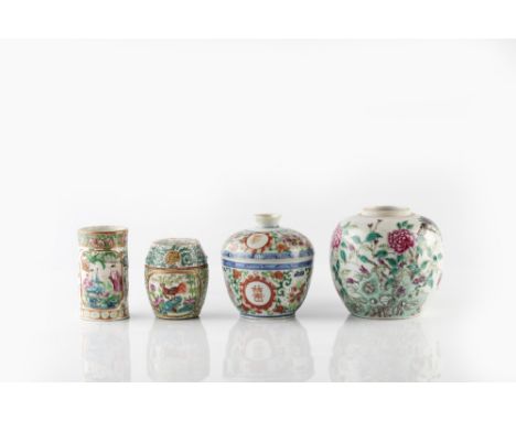 A Chinese famille rose enamelled ginger jar late 19th Century decorated peony flowers and foliage, 13.5cm, and a famille rose