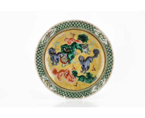 A Chinese Canton dish 19th Century decorated in verte and jaune enamels with kylin playing, 24cm