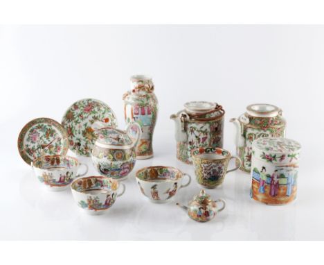 A collection of Chinese Canton  19th Century to include two teapots, a vase, cups and other pieces