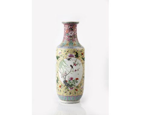 A Chinese porcelain rouleau form vase late 19th Century decorated oval panels with birds, flowers and bamboo and other symbol