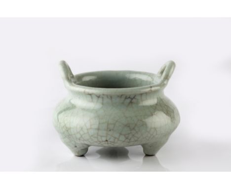 A Chinese Junyao style two handle censer 19th Century with pale blue crackle glaze, on tripod feet, 11.5cm diameter