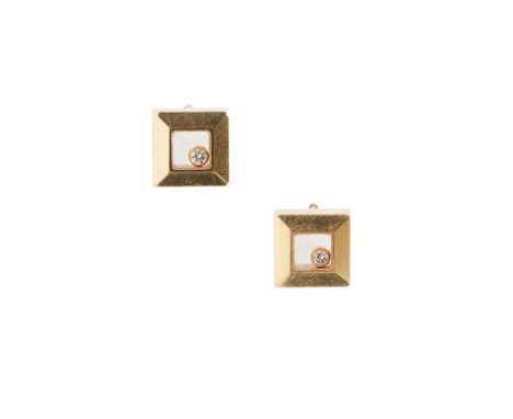 each of square outline, the glazed panel with a single 'loose' diamond, to post and butterfly fittings, signed Chopard, 750 8