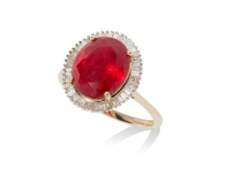 claw set with an oval-cut ruby in a border of baguette-cut diamonds, to a plain 9ct gold shankRing size: P/Q