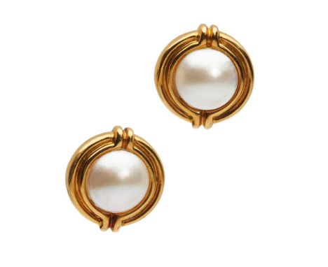 each set with a mabé pearl in a ribbed surround, to clip fittings, stamped TIFFANY &amp; CO 18K, in a black suede box for Tif
