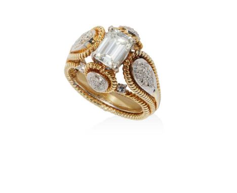 claw set with an emerald-cut diamond in a raised surround with pavé-set eight-cut diamond clusters in a rope-twist border, th