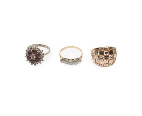 to include an 18ct gold ruby and diamond set cluster ring, to a plain shank; a five stone diamond ring, to a plain unmarked s