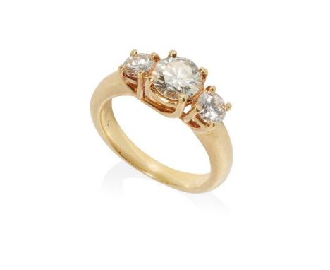 claw set with three graduated round brilliant-cut diamonds, to a plain yellow metal shank stamped 18kRing size: K, estimated 