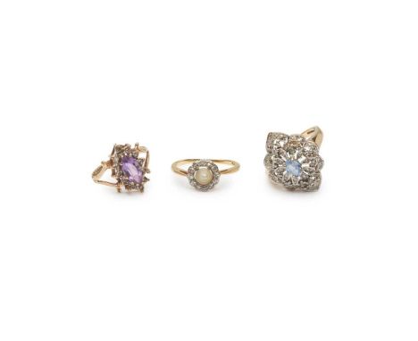 to include a 9ct gold navette shaped amethyst and diamond cluster ring, a 9ct gold Tanzanite and diamond cluster ring, and a 