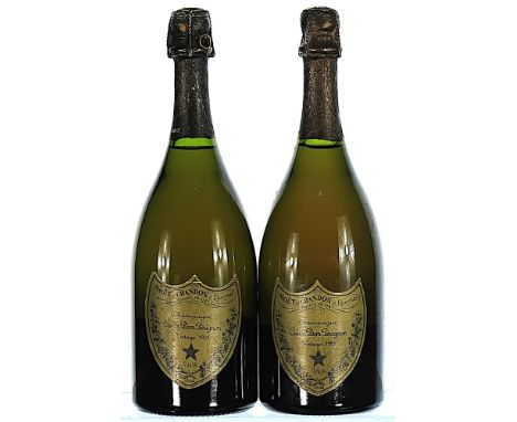 1985 Dom Perignon 2x75cl  Labels and foil slightly damaged.